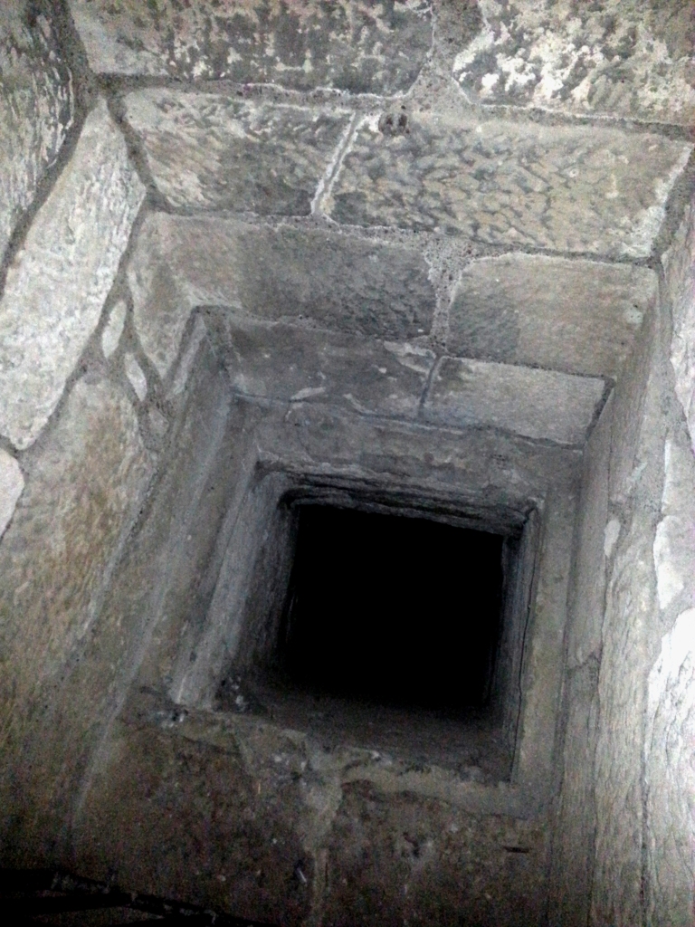 We wandered inside and one of the first things we saw was this hole in the wall that led to a hole in the floor.  It turned out to be a prison.